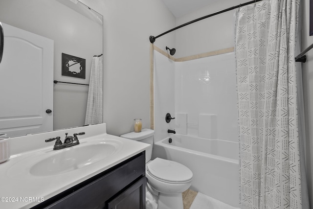 full bathroom featuring shower / bath combination with curtain, vanity, and toilet