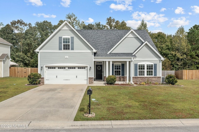 view of front facade with a front lawn and a garage