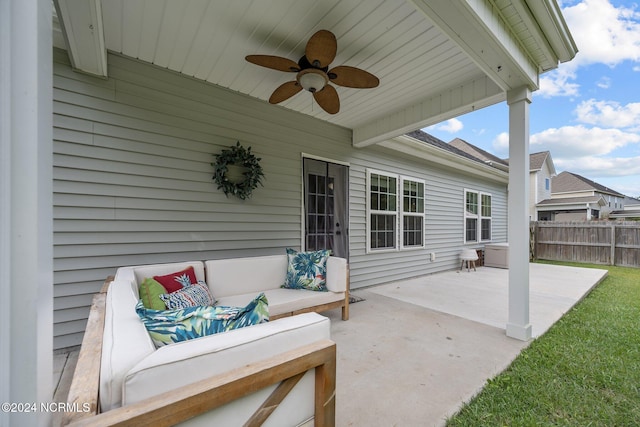 view of patio featuring ceiling fan