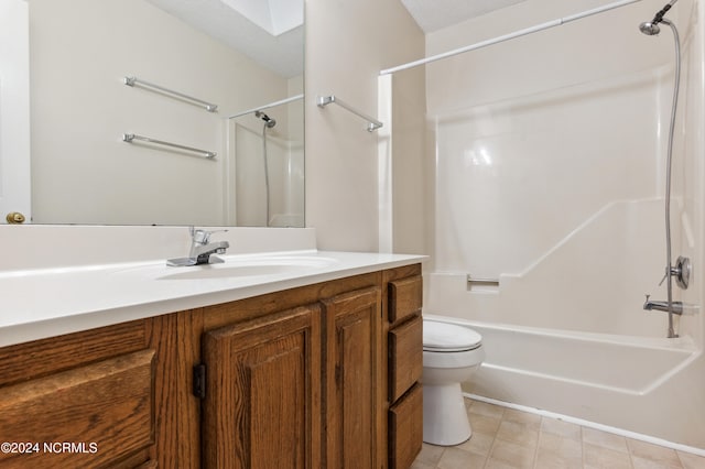 full bathroom featuring toilet, a textured ceiling, vanity, and shower / bath combination