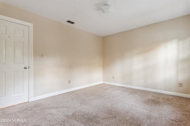 empty room featuring carpet