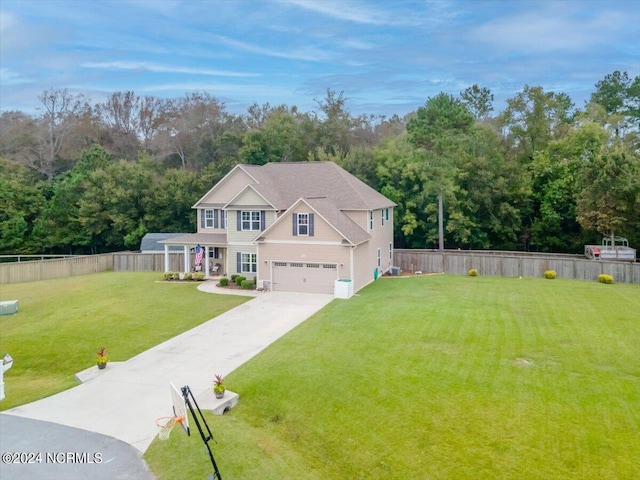 view of front facade with a front lawn and a garage