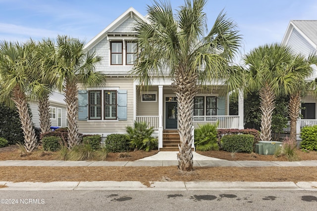 1230 Pinfish Ln, Carolina Beach, NC 28428 - view of front of house with a porch