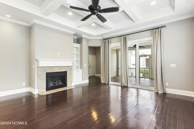 1230 Pinfish Ln, Carolina Beach, NC 28428 - unfurnished living room featuring ceiling fan, coffered ceiling, dark wood-style flooring, a fireplace, and beam ceiling