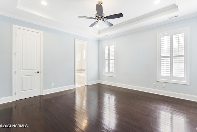 1230 Pinfish Ln, Carolina Beach, NC 28428 - unfurnished room featuring a tray ceiling, ornamental molding, dark wood-style flooring, ceiling fan, and recessed lighting