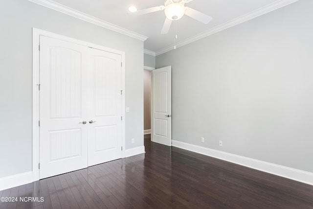 1230 Pinfish Ln, Carolina Beach, NC 28428 - unfurnished bedroom with a closet, wood finished floors, ornamental molding, and a ceiling fan