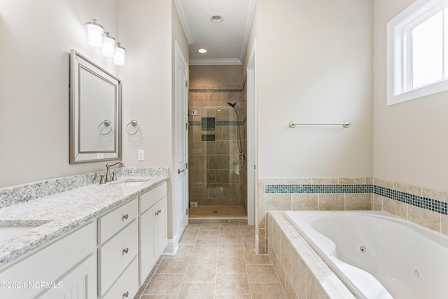 bathroom with tile patterned flooring, ornamental molding, shower with separate bathtub, and vanity