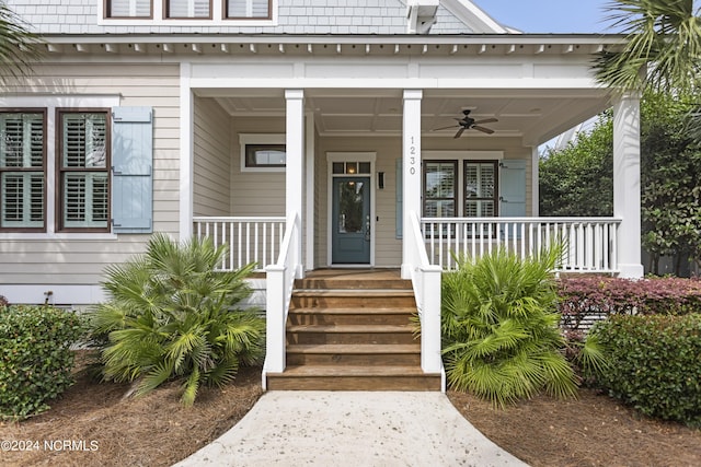 1230 Pinfish Ln, Carolina Beach, NC 28428 - property entrance with covered porch and ceiling fan