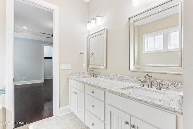 1230 Pinfish Ln, Carolina Beach, NC 28428 - full bath featuring double vanity, ornamental molding, and wood finished floors