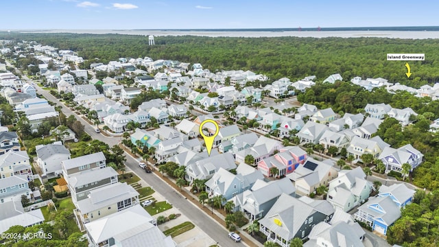 1230 Pinfish Ln, Carolina Beach, NC 28428 - aerial view of residential area with a nearby body of water and a forest