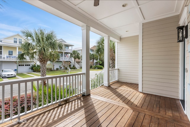 wooden terrace with a porch