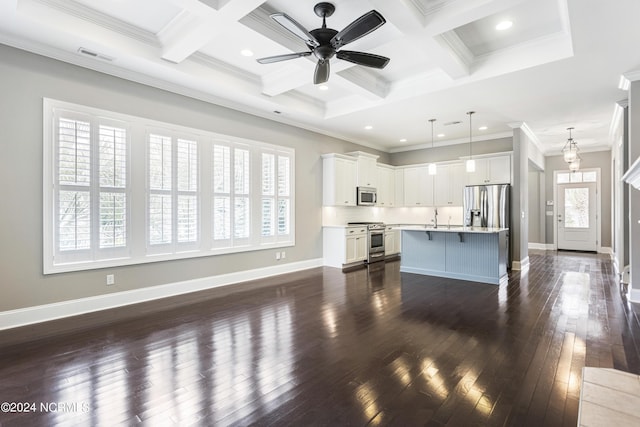 1230 Pinfish Ln, Carolina Beach, NC 28428 - unfurnished living room featuring dark wood-style flooring, ceiling fan, coffered ceiling, crown molding, and beam ceiling