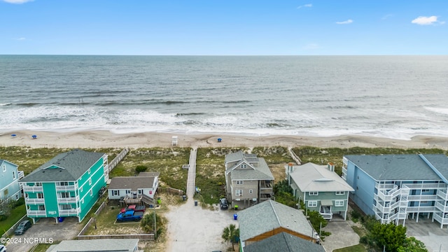 aerial view featuring a beach view and a water view