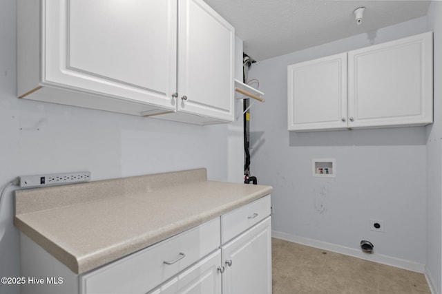 633 Spencer Farlow Dr Unit 12, Carolina Beach, NC 28428 - laundry area featuring hookup for a washing machine, baseboards, cabinet space, and electric dryer hookup