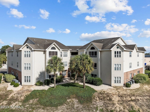 633 Spencer Farlow Dr Unit 12, Carolina Beach, NC 28428 - view of building exterior featuring central AC