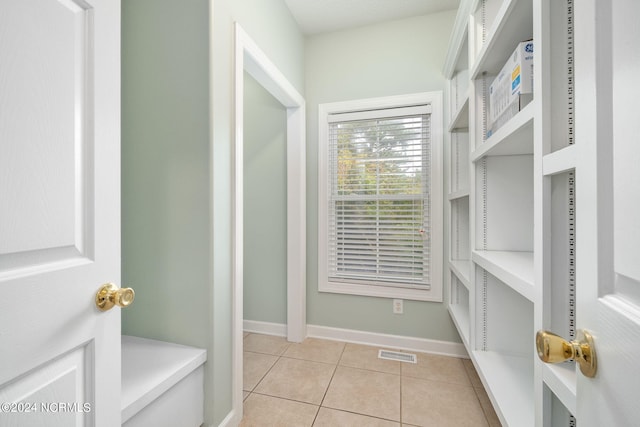 499 Ward Rd, Swansboro, NC 28584 - spacious closet featuring visible vents and light tile patterned floors