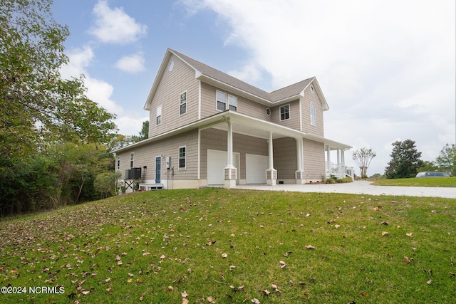 exterior space featuring central air condition unit, a patio area, and a yard