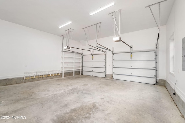499 Ward Rd, Swansboro, NC 28584 - garage featuring a garage door opener