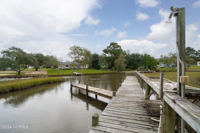 view of dock with a water view