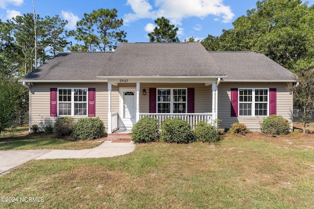 view of front of property with a front lawn and a porch