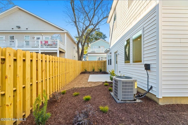 view of yard featuring a patio and cooling unit