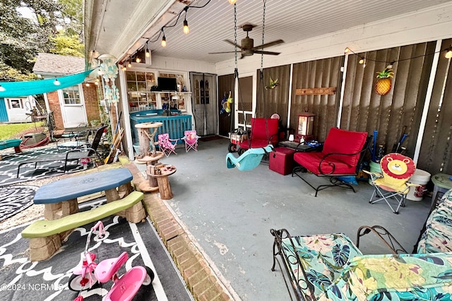 view of patio with ceiling fan