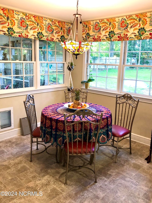 dining space with a healthy amount of sunlight