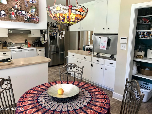 kitchen featuring wall chimney range hood, tasteful backsplash, stainless steel refrigerator with ice dispenser, electric stove, and white cabinetry