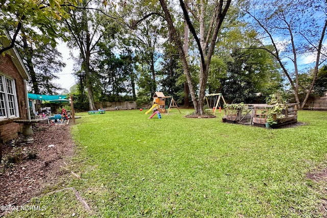 view of yard featuring a playground