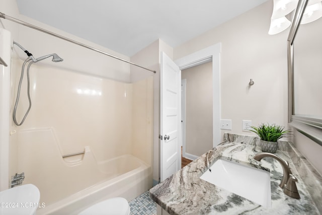 full bathroom featuring vanity, toilet, and shower / washtub combination