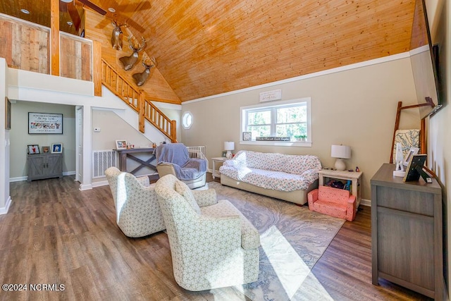 living room with baseboards, wood ceiling, stairway, wood finished floors, and high vaulted ceiling