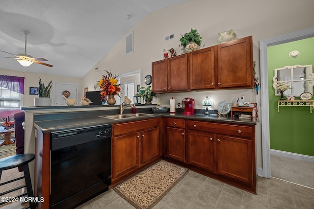 kitchen featuring ceiling fan, sink, dishwasher, kitchen peninsula, and lofted ceiling