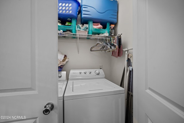 washroom with washer and clothes dryer