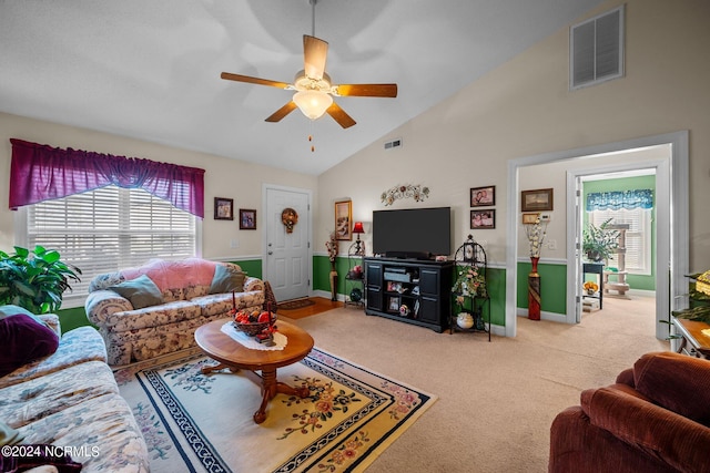 living room featuring high vaulted ceiling, carpet flooring, and ceiling fan