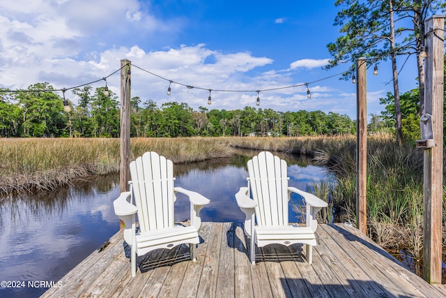 view of dock with a water view