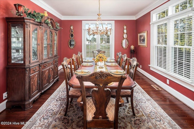 dining area featuring a chandelier, crown molding, and dark hardwood / wood-style flooring