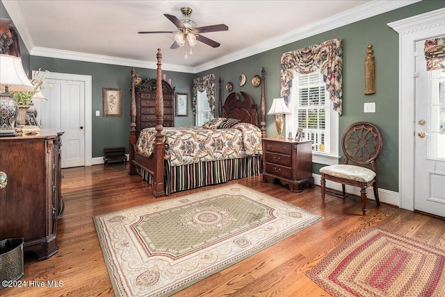 bedroom with ceiling fan, crown molding, and wood-type flooring