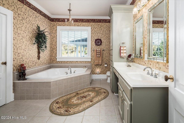 bathroom featuring toilet, vanity, and crown molding