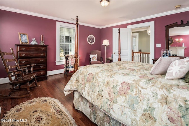 bedroom with dark wood-type flooring and crown molding