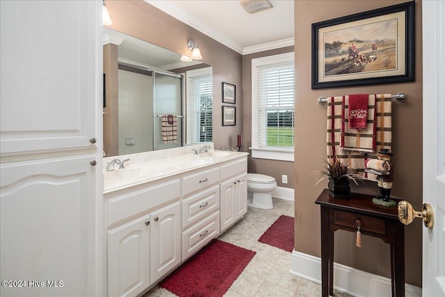 bathroom featuring toilet, an enclosed shower, vanity, and crown molding