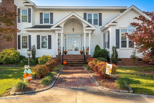 view of front of home with a front lawn