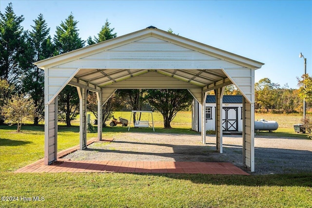 view of home's community featuring a yard and a storage shed