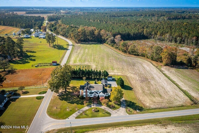 birds eye view of property featuring a rural view