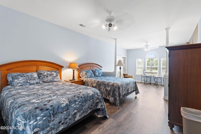 bedroom featuring ceiling fan and dark hardwood / wood-style floors