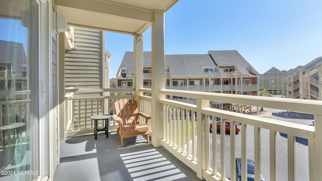 balcony featuring a residential view