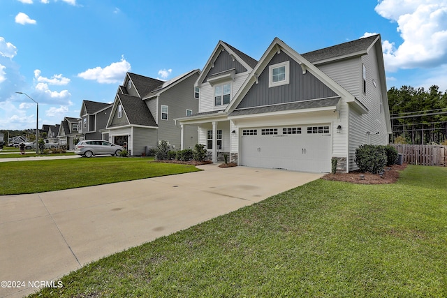 craftsman-style home with a front lawn and a garage