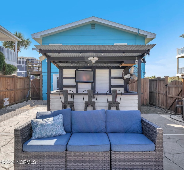 view of patio / terrace with outdoor lounge area and ceiling fan