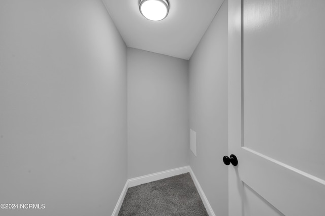 interior space featuring baseboards and carpet