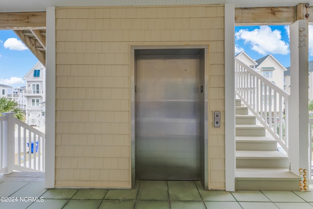 view of exterior entry with elevator