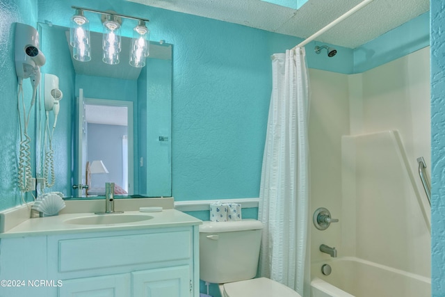 full bathroom featuring vanity, shower / tub combo, a textured ceiling, and toilet